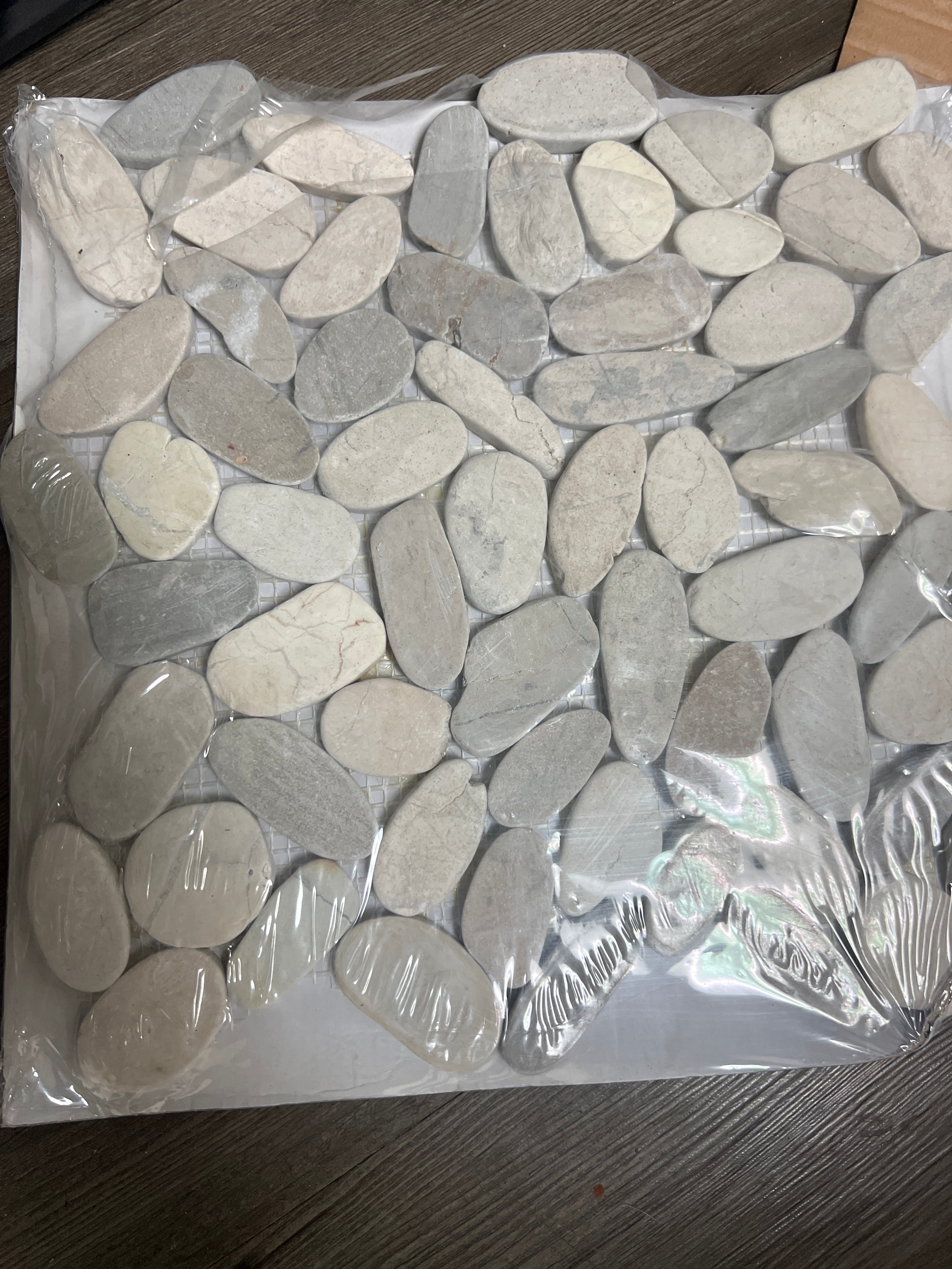 Sliced Pebble Truffle 12 in. x 12 in. x 0.38 in. Tumbled Marble Mesh-Mounted Mosaic Tile (0.97 sq. ft./Each) 10qty per box $50 per box!